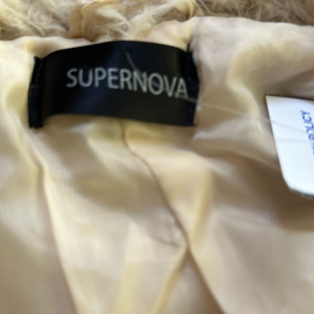 Ladies new size small furry jacket.
